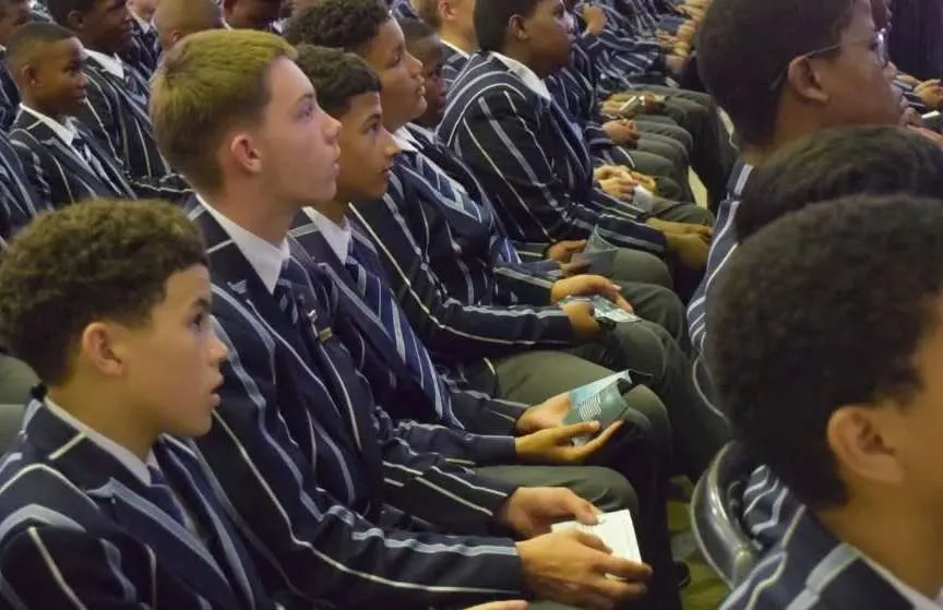 Muir College boys in blazers at assembly